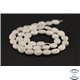 Perles semi précieuses en howlite - Ovale/10 mm