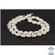 Perles semi précieuses en howlite - Ovale/10 mm