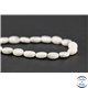 Perles semi précieuses en howlite - Ovale/10 mm