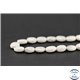 Perles semi précieuses en howlite - Ovale/10 mm