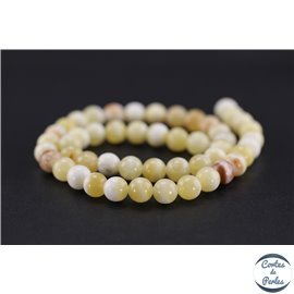 Perles en honey jade - Rondes/8mm