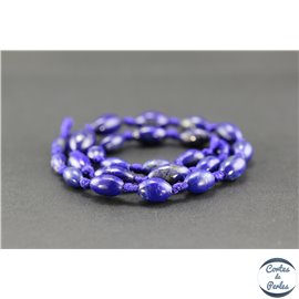 Perles semi précieuses en lapis lazuli d'Afghanistan - Grain de riz/9 mm