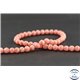 Perles en rhodochrosite d'Argentine - Rondes/6 mm - Grade AA