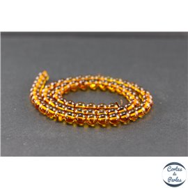 Perles en ambre cognac clair de la Baltique - Rondes/6mm - Grade A