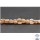 Perles en pierre de Soleil - Ovales/10mm - Grade A