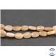 Perles en pierre de Soleil - Ovales/10mm - Grade A