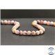 Perles en opale rose d'Afrique - Rondes/8mm - Grade AB