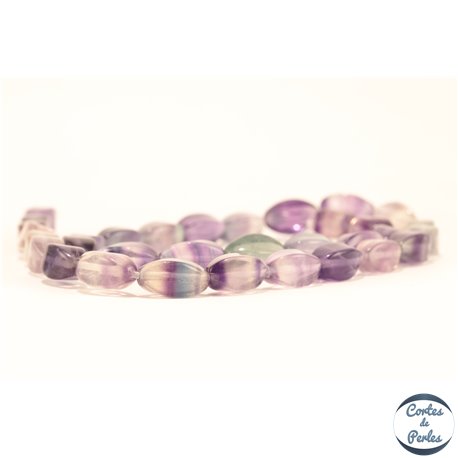 Perles semi précieuses en Fluorite - Twist/6 mm - Light Violet