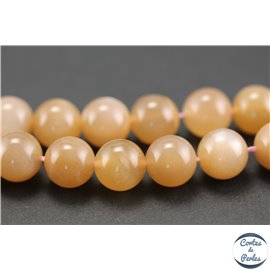 Perles semi précieuses en pierre de soleil - Rondes/10 mm - Rose saumon - Grade AAA