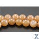 Perles semi précieuses en pierre de soleil - Rondes/10 mm - Rose saumon - Grade AAA