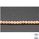 Perles semi précieuses en pierre de soleil - Rondes/4 mm - Rose saumon - Grade AAA