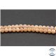 Perles semi précieuses en pierre de soleil - Rondes/4 mm - Rose saumon - Grade AAA